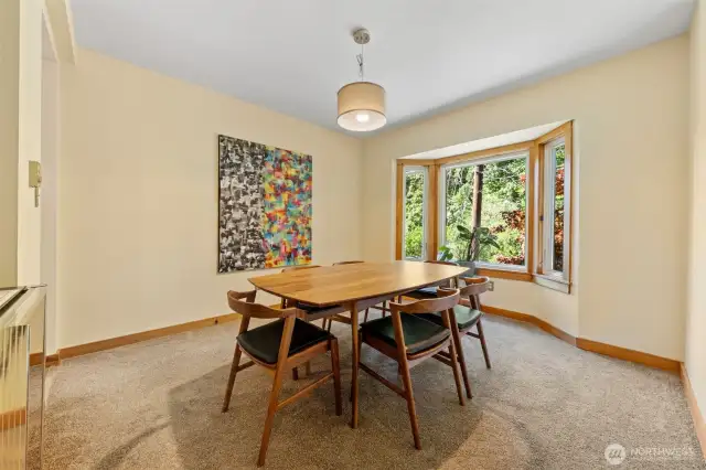 Spacious dining room has ample space for a buffett....