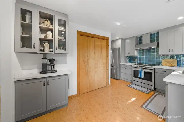 Updated kitchen with shaker cabinets and coffee bar!