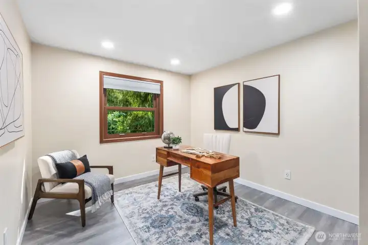 The main floor bonus room offers flexible use as a home office, guest room, or spare bedroom. Like all rooms in the home, it is equipped with dimmer switches, allowing customized ambiance and lighting to suit any preference.