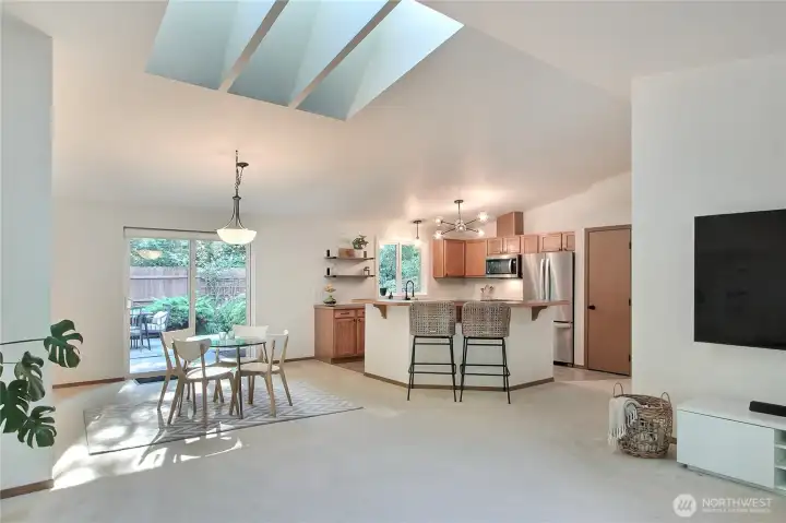 View from your Great Room to your Dining Room and kitchen, who doesn't love open concept?! So easy to entertain in this home.