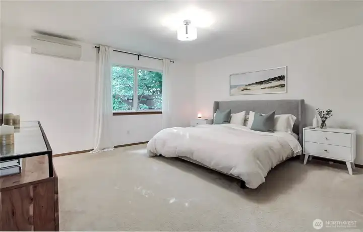 Primary Bedroom view one, generous in size, will fit all of your furniture. Newer mini-split to keep you comfortable year-round. All rooms have wall/cadet heaters as well for backup.