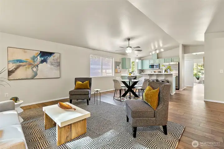 You’ll love the open-concept layout where the great room, dining area, and kitchen come together effortlessly. The breakfast bar adds the perfect spot for casual meals or conversation while keeping everyone connected in the heart of the home.