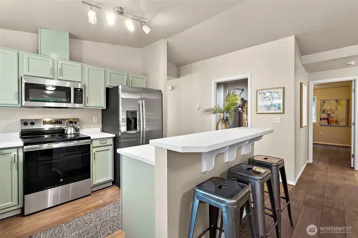 The kitchen is a true standout—completely updated with brand-new appliances that convey, making move-in day effortless.