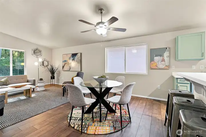 The great room flows seamlessly into the dining area and kitchen, creating a true open-concept design perfect for modern living.