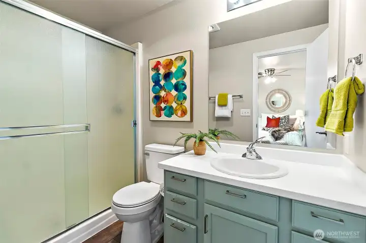 Enjoy the privacy of your own ¾ bathroom within the primary suite—fresh, modern, and designed for easy everyday living.