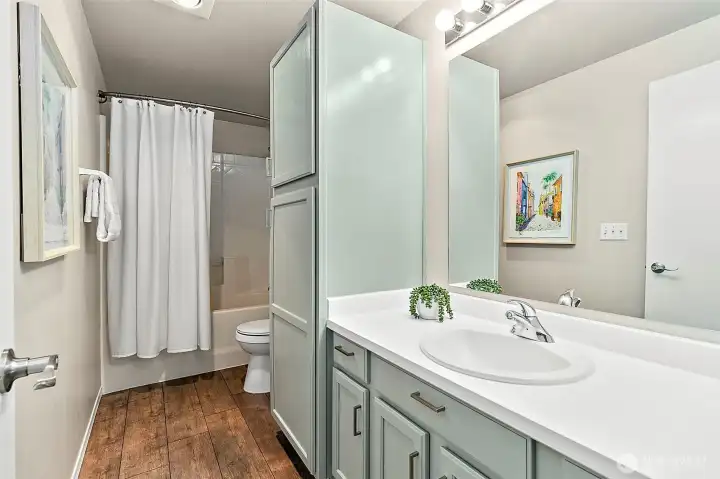 A beautifully updated full bath combines modern style with everyday convenience.