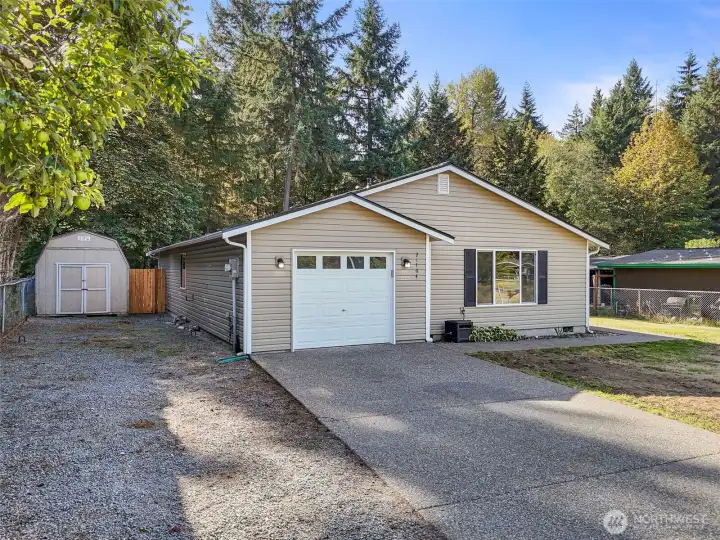 Enjoy low-maintenance living with durable vinyl siding and a handy storage shed for all your extras. The generous RV and boat parking make it easy to live the Northwest lifestyle to the fullest.