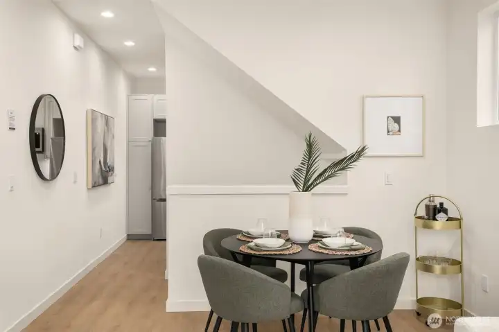 Striking modern staircase and entryway that sets a contemporary tone the moment you walk in.