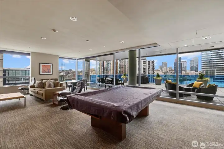 pool and ping pong table along with gaming station