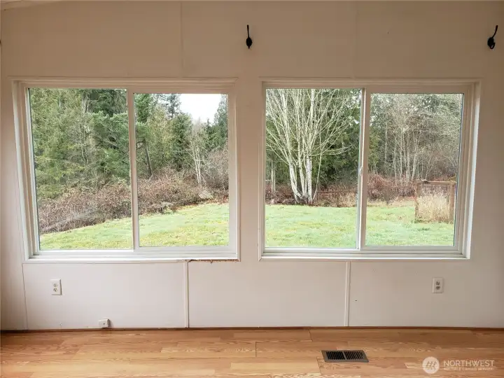 Picture of the Huge Second Living Room with Laminate Flooring and a great Private Peaceful View.