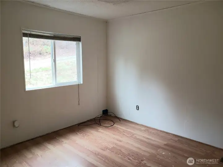 Large Second Bedroom with Laminate Flooring.