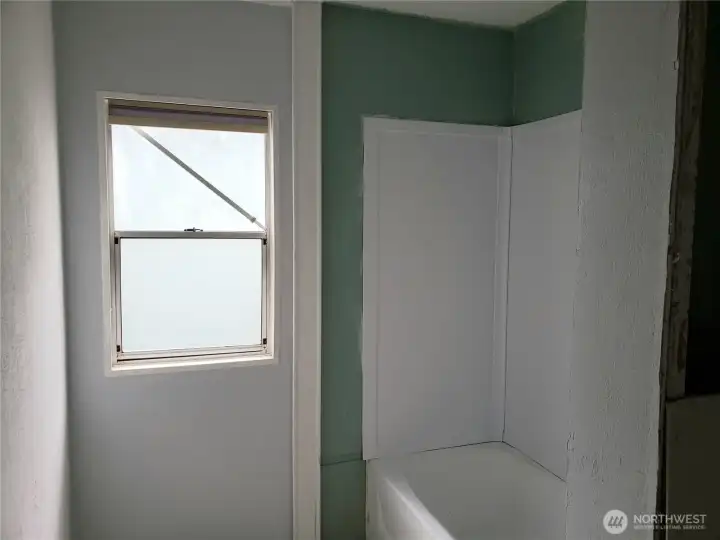 Main Guest Bathroom Showing Shower Tub Unit.
