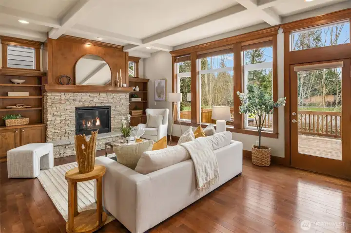 Open concept main level living space with tranquil mountain and pond view, and south facing windows bring in plenty of sunshine! Look out for Mount Ranier view in a clear day!