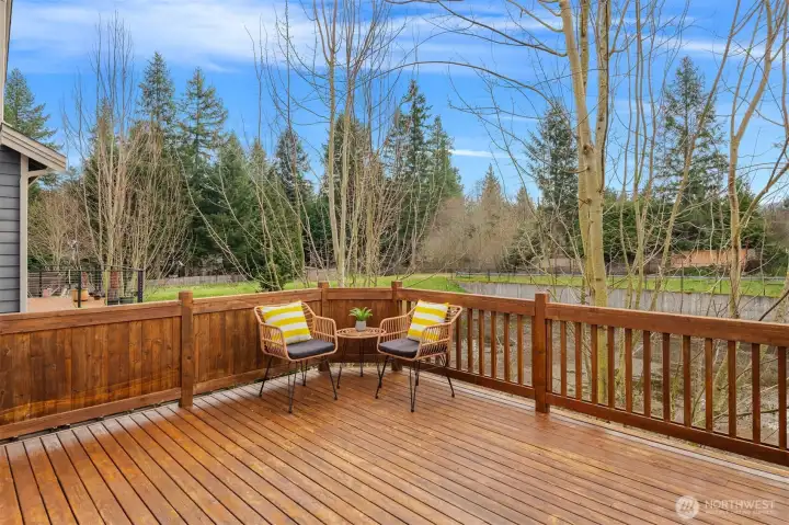 Newly stained deck allows you to take in the peace from nature!