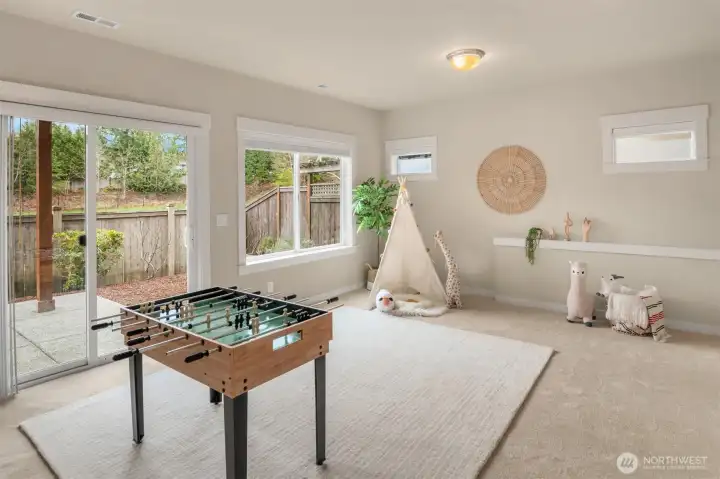 Sun-filled lower level rec room could be ideal for guests, or multi-generational living!