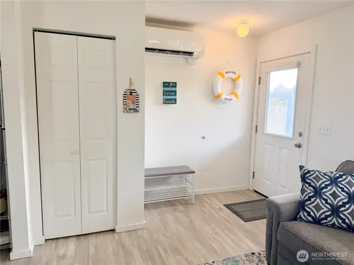 Entryway w/ door that has custom pull-down shades