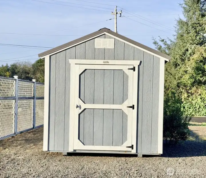 Shed in front yard
