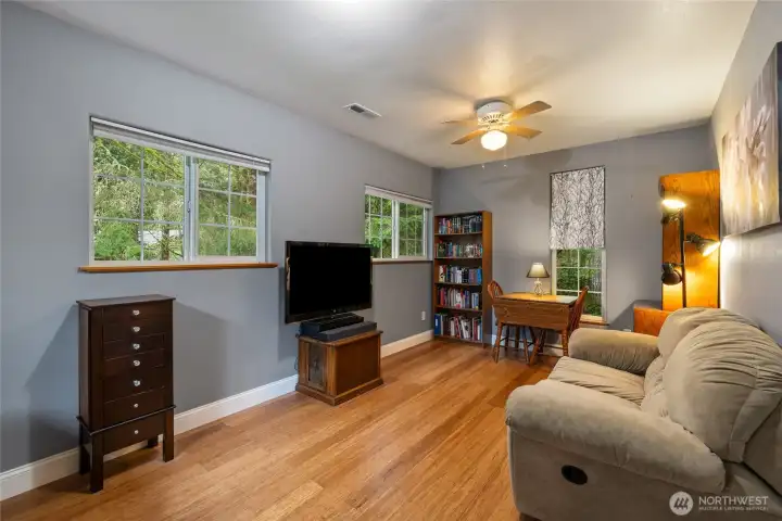 Extra space in the primary bedroom for a media room, library, nursery, office, gym, etc.