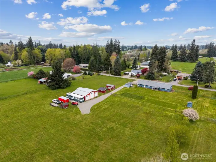 You get the rural setting, the acreage, the outbuildings, the breathing room, but you are also close to local favorites people genuinely love. Lattin's Country Cider Mill & Farm is nearby for warm apple fritters, cider runs, seasonal events and all the fall nostalgia you could ask for. Then there’s Johnson's Smokehouse and Country Store with its deli, restaurant, country market feel and occasional live music, the kind of place people end up frequenting more than they expected. And for broader services and shopping, you’re only about 15 minutes out.