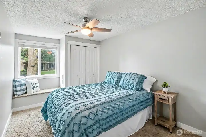 1st bedroom with window seating.