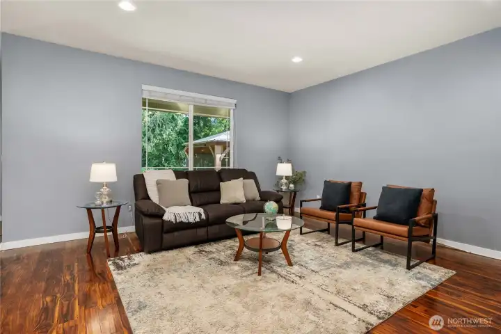 Huge living room with 10 foot ceilings.
