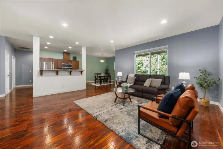 Large breakfast bar area adjacent to living room.