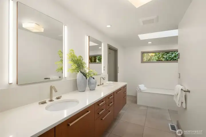 Two closets and an updated five-piece bath make it thoroughly modern.