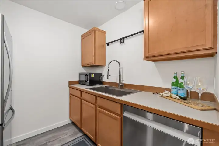 Kitchen with stainless steel dishwasher