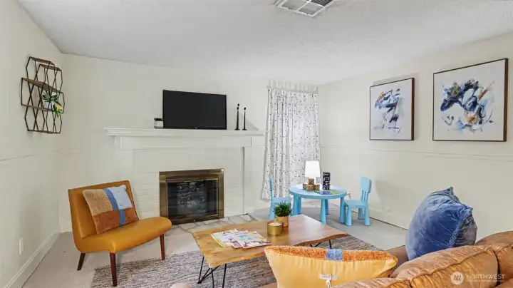 A wood-burning fireplace is the centerpiece of this spacious bonus room, which can be used as a den, office, playroom, or can be reimagined into an additional bedroom. A wood-burning fireplace is the centerpiece of this spacious bonus room, which can be used as a den, office, playroom, or can be reimagined into an additional bedroom.