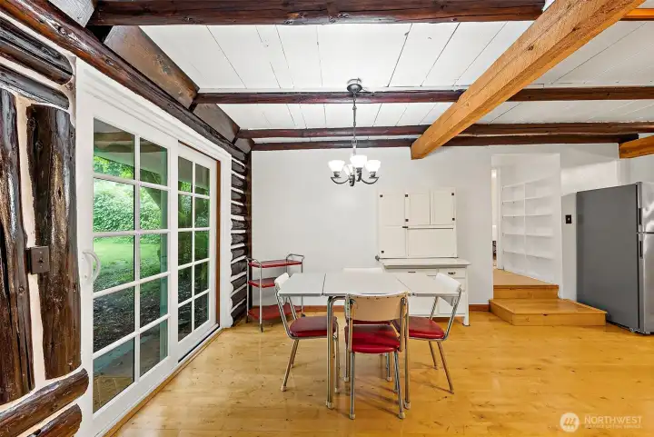 Eat in kitchen space with patio door access to backyard. Stairs on right lead to full remodeled bathroom, laundry room and den/office. Eat in kitchen space with patio door access to backyard. Stairs on right lead to full remodeled bathroom, laundry room and den/office.