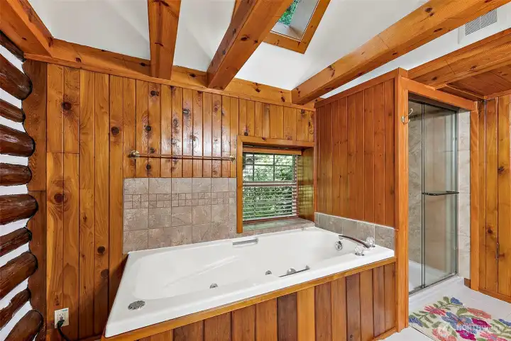Remodeled bath with large jetted tub, large stand alone shower. View into private backyard. Remodeled bath with large jetted tub, large stand alone shower. View into private backyard.