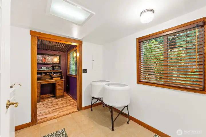 Full laundry room off from the main bathroom. Full laundry room off from the main bathroom.