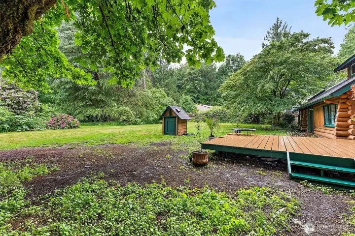 View into backyard from side of garage. View into backyard from side of garage.