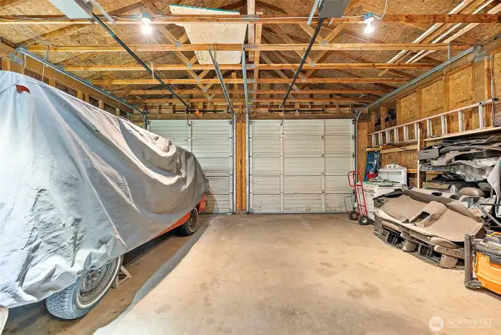 High ceilings and space for storage above in this large 2 car detached garage. High ceilings and space for storage above in this large 2 car detached garage.