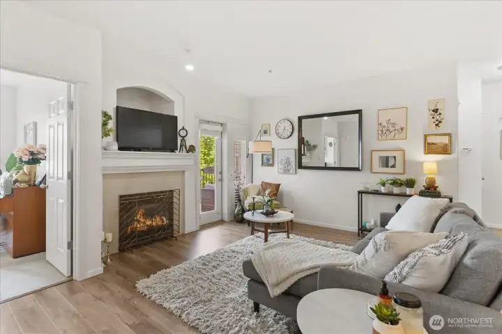 Beyond the fireplace is the door to your private balcony.