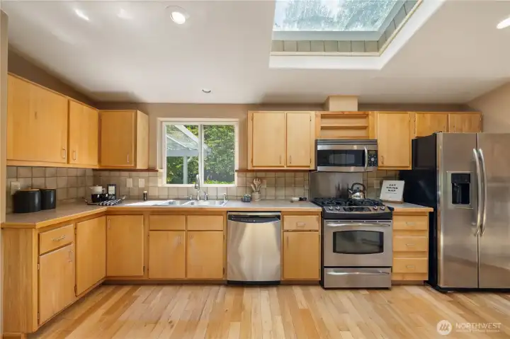 Skylight keeps the kitchen bright and cheerful Skylight keeps the kitchen bright and cheerful