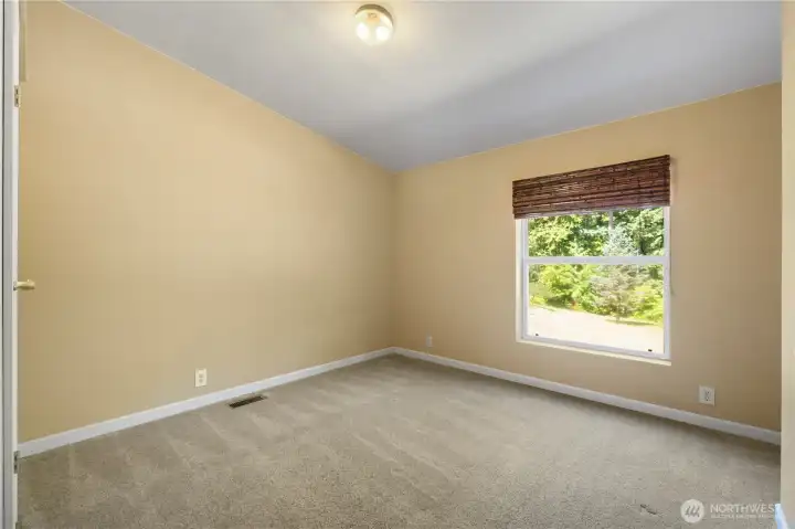 One of two bedrooms on the opposite side of the house One of two bedrooms on the opposite side of the house