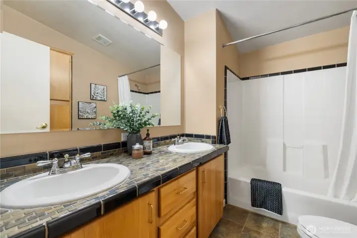 Double sinks with shared bathroom Double sinks with shared bathroom