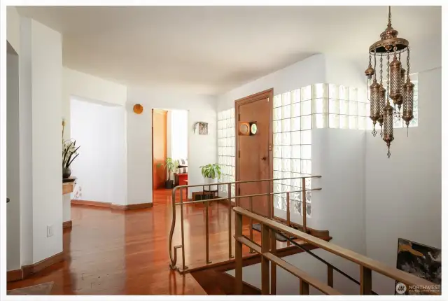 Foyer and Staircase on Right | Left Door to Living Room | Center Door to Kitchen