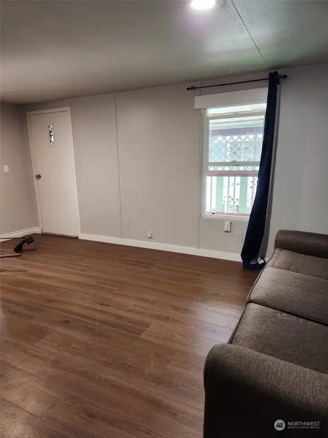 Door leads to the enclosed porch from the living room