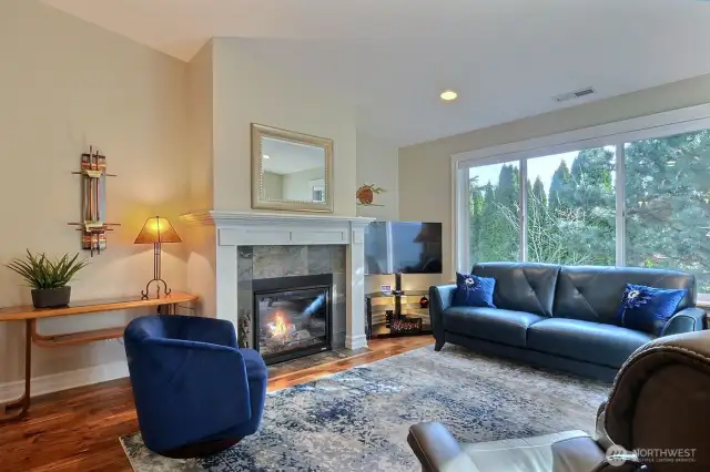 Living area is roomy, bright and cheerful. Gas fireplace for cozy evenings