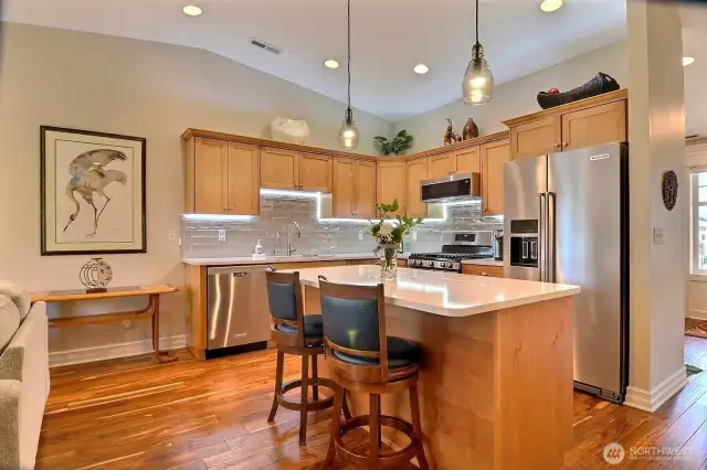 Remodeled kitchen with quartz counters & back splash