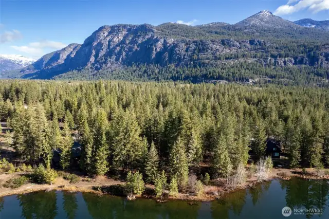 Incredible Mountain landscape surrounds Lot B at Wilson Ranch, Early Winters. Rare offering of a Lakeside Lot.