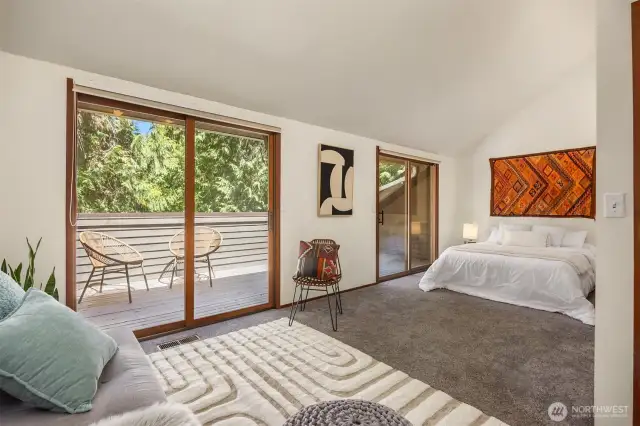 Main floor bedroom with private deck