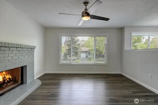 Beautiful LVP flooring throughout primary living areas on main floor.
