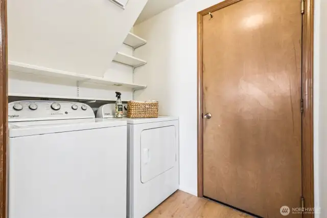 Main floor laundry room leads out to the garage.