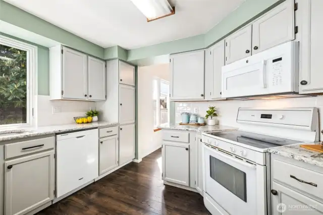 The formal dining space flows easily into the kitchen.