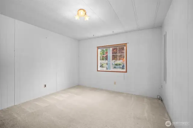 Bedroom 2 with a window facing the front yard.