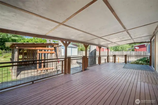 Enjoy quiet mornings with your coffee or host family and friends for a BBQ on this large deck.