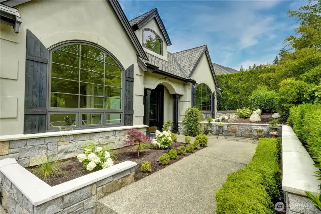 Exceptional curb appeal meets timeless design in this beautifully updated Sammamish home. Featuring a spacious garage, manicured landscaping, and a stately entryway, this property exudes elegance.